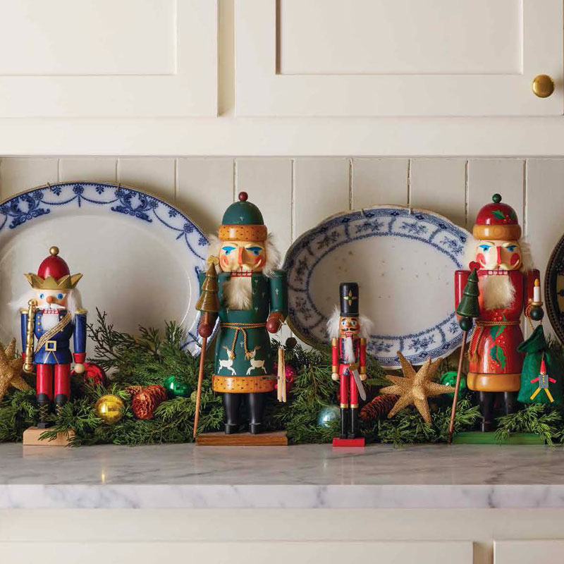 Kitchen display of nutcrackers and blue and white plates