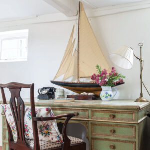 Green desk with boat