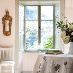 Breakfast area with round table and window