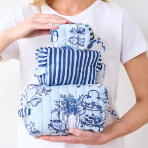 Quilted blue cosmetic pouches
