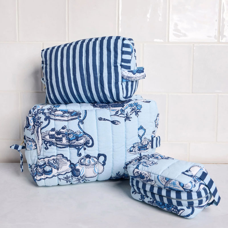 Quilted blue cosmetic pouches