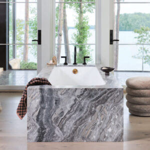 Bathtub in front of the window