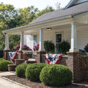 Front porch with flags
