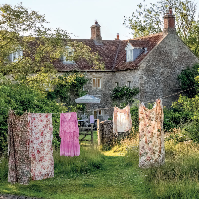 Clothes hanging to dry outside a cottage