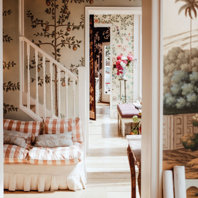 Interior foyer with patterned wallpaper