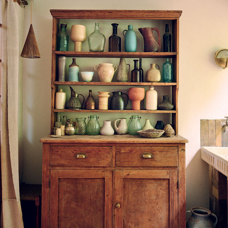 Shelf with pottery