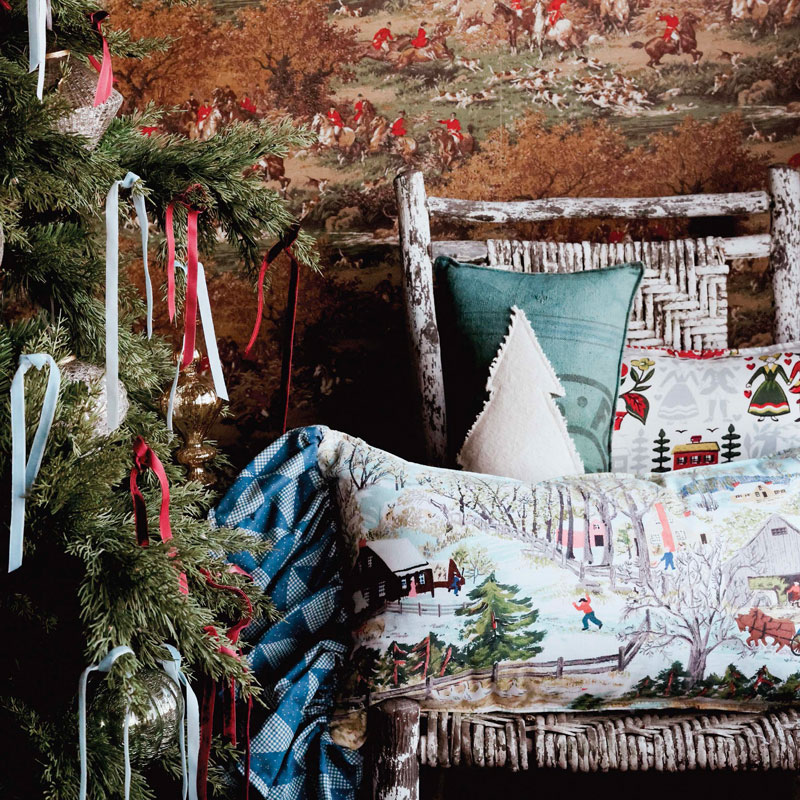 Christmas tree with ribbon and Christmas pillows